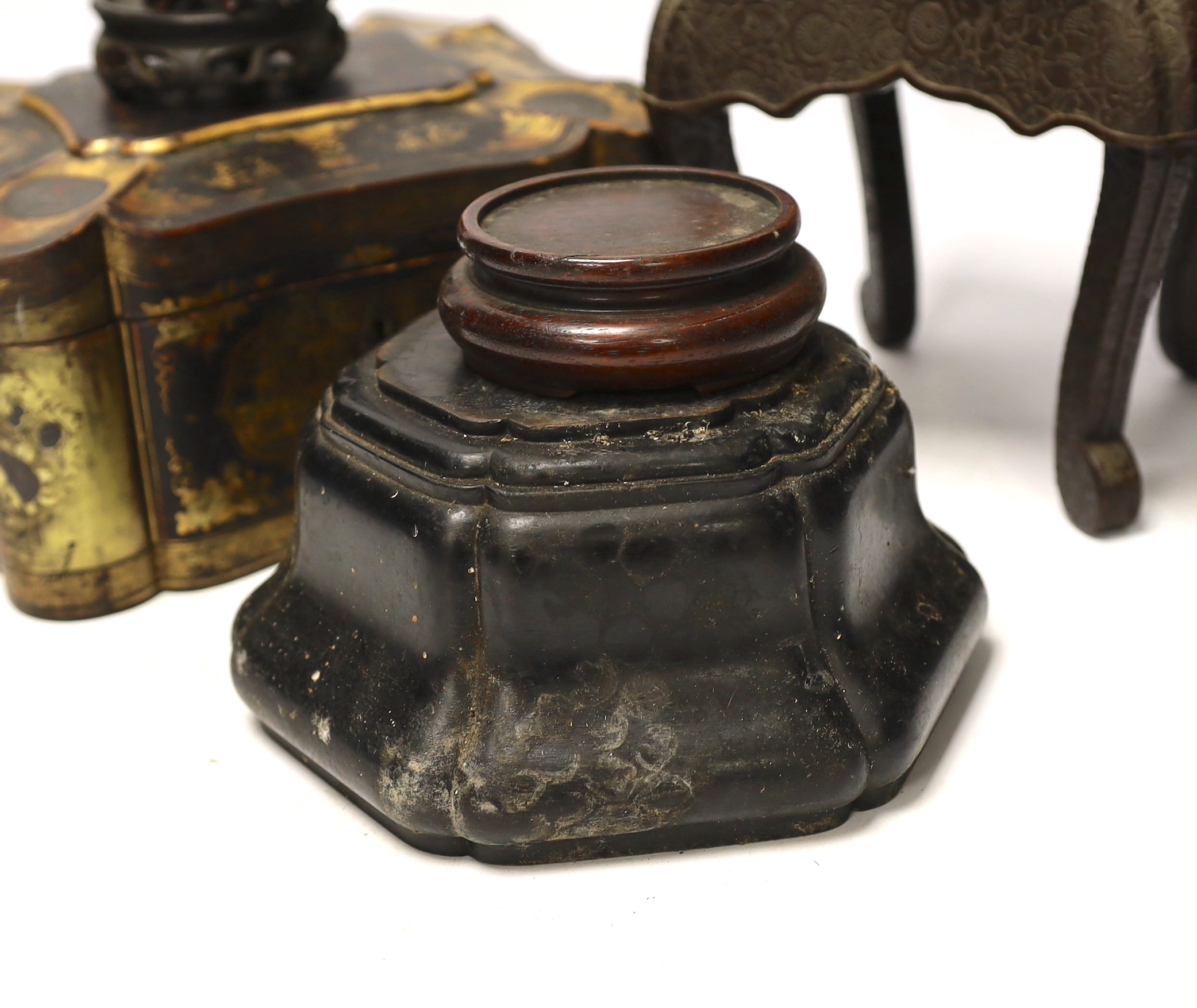 A Chinese lacquer and gilt casket together with various carved stands, largest 17cm high